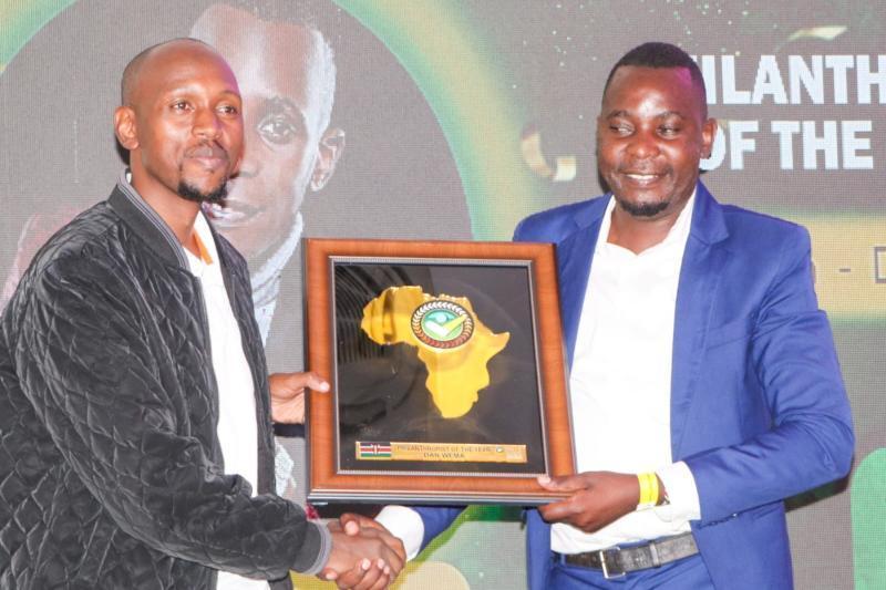 File image of Geoffrey Mosiria receiving an award.